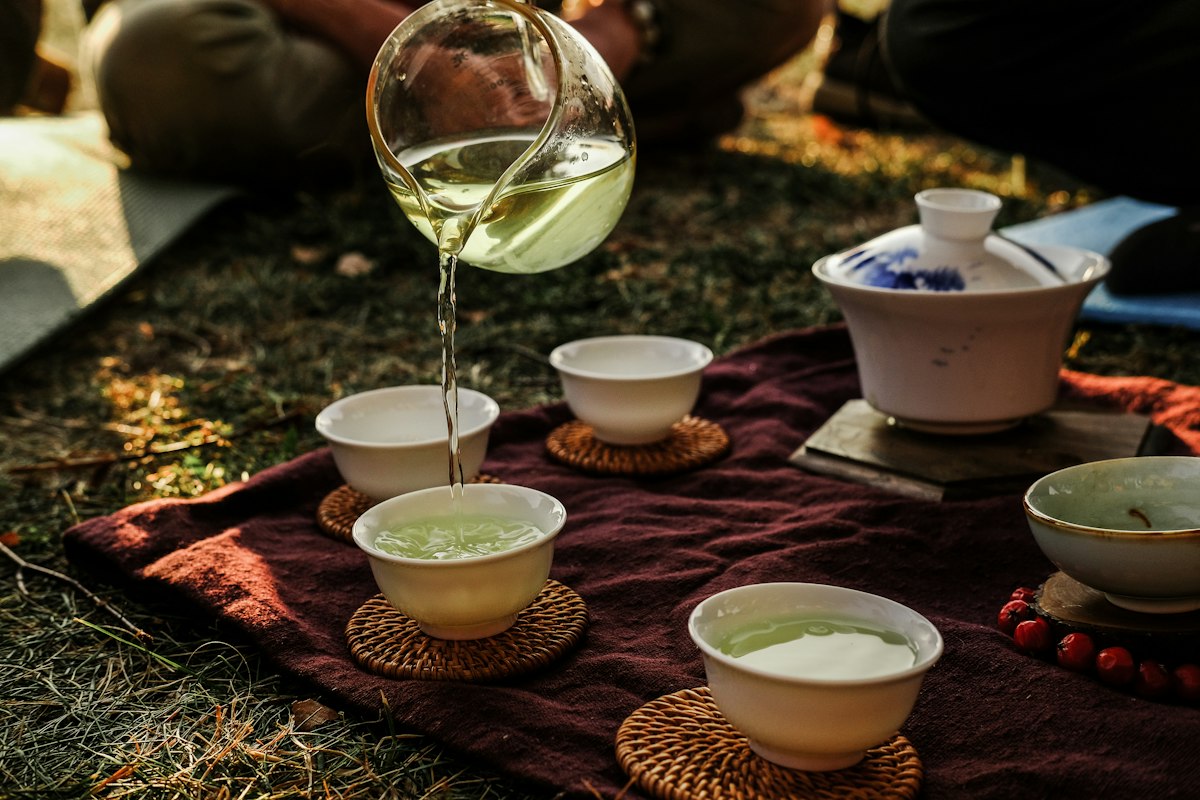 Tea master selecting premium tea leaves